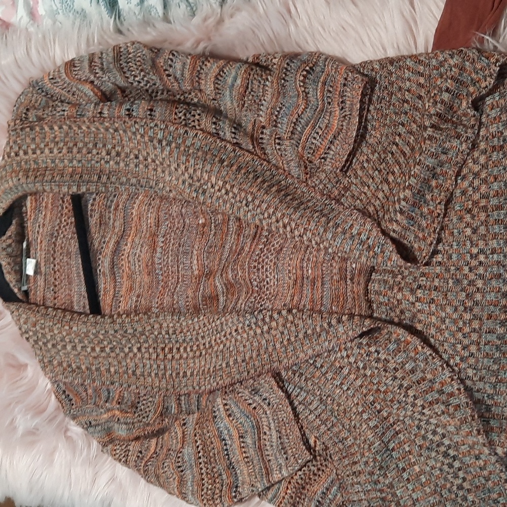 A knitch above cardigan size medium